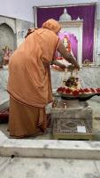 H.H. Swamiji garlanding Shivalinga, at Girirajeshwari temple, Samvit Dham Jodhpur